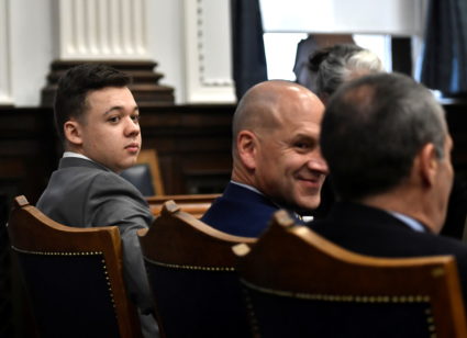 Kyle Rittenhouse looks back as he sits with his attorneys before the day starts at the Kenosha County Courthouse in Kenosha, Wisconsin, U.S. November 12, 2021. Photo by Sean Krajacic/Pool via REUTERS