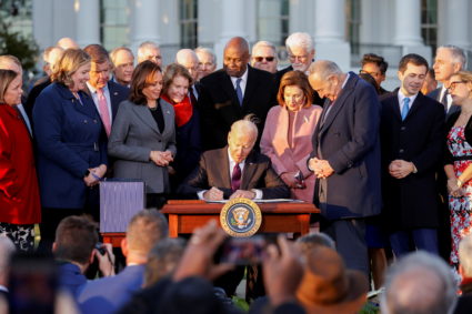 U.S. President Joe Biden signs the "Infrastructure Investment and Jobs Act", on the South Lawn at the White House in Washington, U.S., November 15, 2021. Photo by Jonathan Ernst/REUTERS