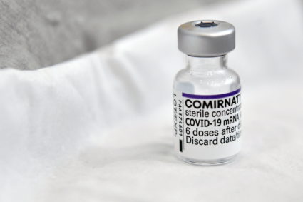 A vial of a Pfizer coronavirus disease (COVID-19) vaccine booster called Comirnaty is seen at the University College Dublin (UCD) campus clinic for inoculating frontline workers in Dublin, Ireland, November 28, 2021. Photo by Clodagh Kilcoyne/REUTERS