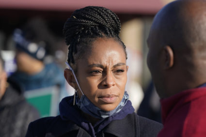 Democratic candidate Shontel Brown talks with a man at the Bedford Community Center, Tuesday, Nov. 2, 2021, in Bedford Heights, Ohio. Brown is running for Ohio's 11th Congressional District. AP Photo/Tony Dejak