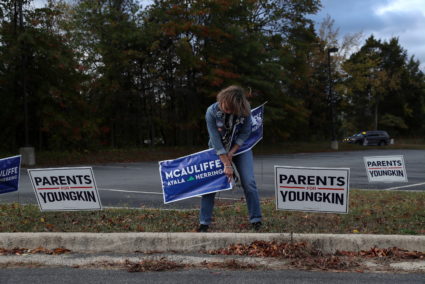 People express their anger at a Loudoun County School board meeting in Ashburn
