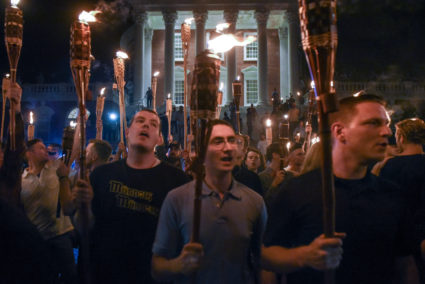 White nationalists participate in a torch-lit march on the grounds of the University of Virginia ahead of the Unite the Right Rally in Charlottesville, Virginia on August 11, 2017. Picture taken August 11, 2017. Photo by Stephanie Keith/REUTERS