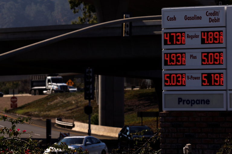 Gas prices grow along with inflation as this sign at a gas station shows in San Diego