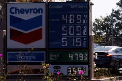 Gas prices grow along with inflation as this sign at a gas station shows in Carlsbad, California