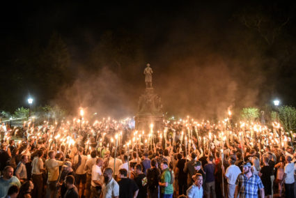 FILE PHOTO: FILE PHOTO: White nationalists participate in a torch-lit march on the grounds of the University of Virginia a...