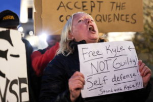 Protestors demonstrate outside the Kenosha County Courthouse during the trial of Kyle Rittenhouse in Wisconsin, U.S.