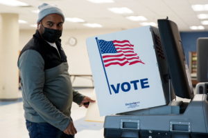 A voter cast their balot as the governor's race in Virginia remains the most closely watched contest nationally in the U.S...