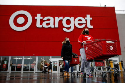 Shoppers exit a Target store during Black Friday sales in Brooklyn, New York