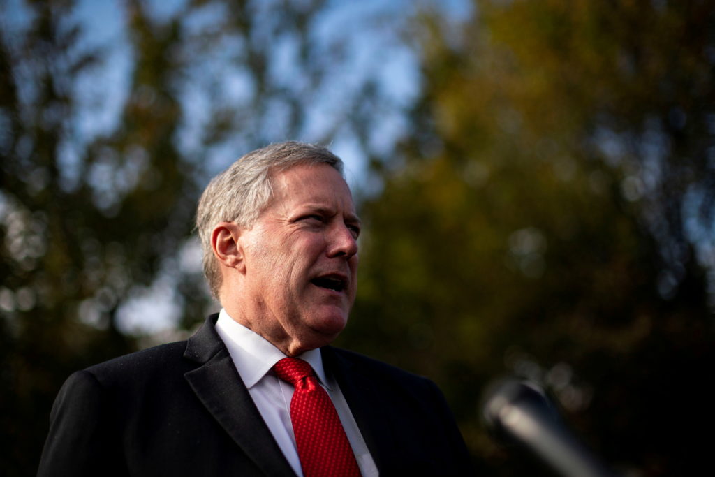 FILE PHOTO: White House Chief of Staff Mark Meadows speaks to reporters following a television interview, outside the Whit...