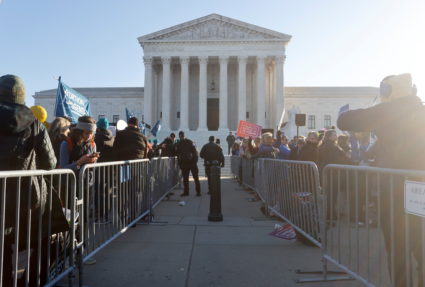 Anti-abortion and pro-abortion rights protesters gather outside Supreme Court in Washington