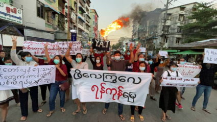 Protestors march against Aung San Suu Kyi's verdict, in Yangon