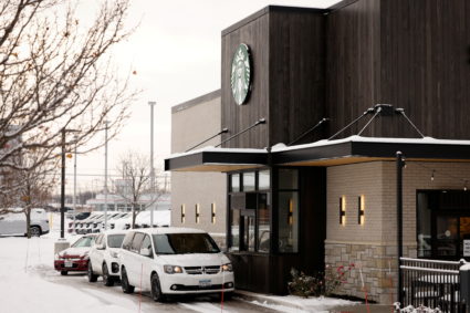A drive-thru line is seen at a Starbucks in Hamburg, a suburb of Buffalo, New York, U.S., December 8, 2021. Photo by Lindsay DeDario/REUTERS