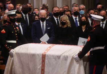 U.S. President Joe Biden, first lady Jill Biden and Vice President Kamala Harris watch the cakset of late Senate Majority Leader Bob Dole during a memorial service honoring Dole at the Washington National Cathedral in Washington, U.S., December 10, 2021. Photo by Leah Millis/REUTERS