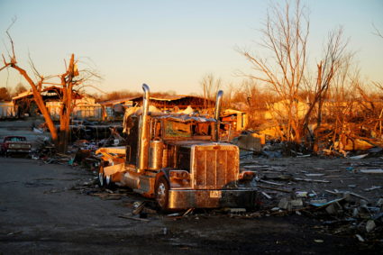 A semi truck sits amidst debris after a devastating outbreak of tornadoes ripped through several U.S. states, in Mayfield, Kentucky, U.S. December 13, 2021. Photo by Cheney Orr/REUTERS
