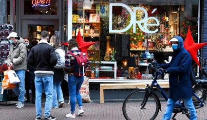 People do their Christmas shopping before the Netherlands go into "strict" Christmas lockdown, in Nijmegen
