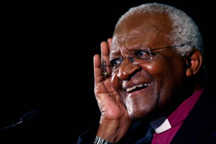 FILE PHOTO: Archbishop Desmond Tutu gestures at the launch of a human rights campaign marking the 60th anniversary of the ...