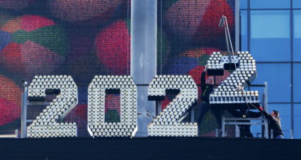 Workers add the number 2 to the numerals above Times Square ahead of New Year's Eve celebrations in Manhattan, New York City