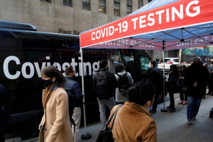 FILE PHOTO: People wait in line to take coronavirus disease (COVID-19) tests at pop-up testing site in New York