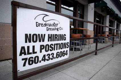 FILE PHOTO: A restaurant advertising jobs looks to attract workers in Oceanside, California