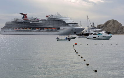 FILE PHOTO: Carnival Panorama passengers test for COVID-19 in Cabo San Lucas