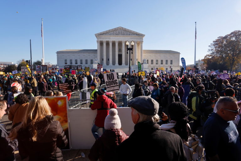 Anti-abortion and pro-abortion rights protesters gather outside Supreme Court in Washington