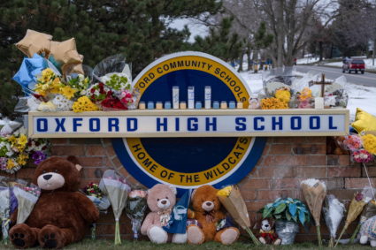A memorial is seen at Oxford High school, a day after a shooting that left four dead and eight injured, in Oxford, Michigan. December 1, 2021. REUTERS/Seth Herald