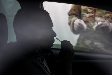 A person uses a nasal swab to provide a sample to be tested for the coronavirus disease (COVID-19) as cases surge across the state, in New Orleans, Louisiana, U.S., August 6, 2021. Photo by Callaghan O'Hare/REUTERS