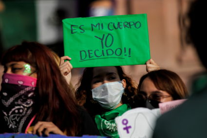 A woman holds up a banner which reads "My body, I decide" during a protest to celebrate the decision of the Supreme Court of Justice of the Nation (SCJN) that declared the criminalization of abortion as unconstitutional, in Saltillo, Mexico September 7, 2021. Photo by Daniel Becerril/REUTERS