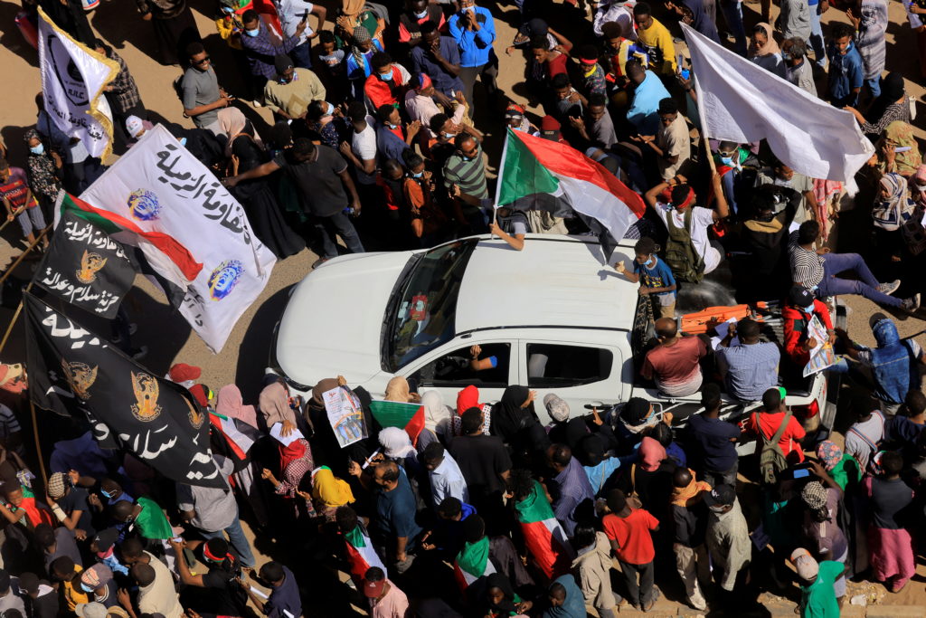 Protesters march during a rally against military rule following last month's coup in Khartoum