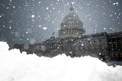 Snow falls during a winter storm on Capitol Hill in Washington