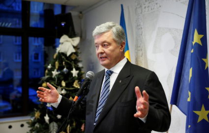 Ukrainian former President Poroshenko gives a news conference in Warsaw