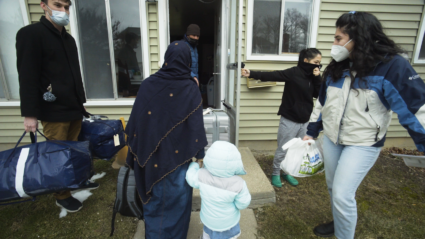 Move in day for Afghan families, with an assist from Eastern Michigan University students and Jewish Family Services of Washtenaw County in Ypsilanti, Michigan | Photograph by Bill Kubota, Detroit Public TV