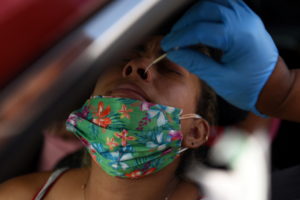 Healthcare workers arrive for a shift change in Texas