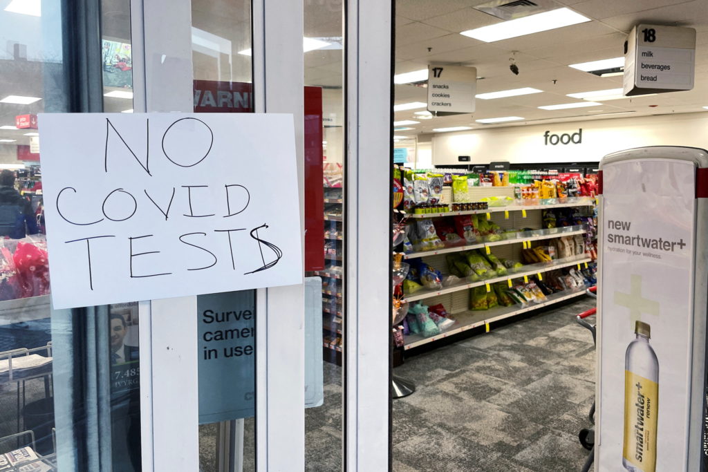 A hand written sign reads "No Covid Tests" in Somerville