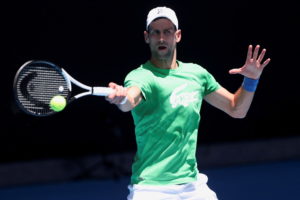 Serbian tennis player Novak Djokovic practices at Melbourne Park as questions remain over the legal battle regarding his v...