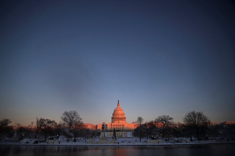 Snow falls during a winter storm on Capitol Hill in Washington