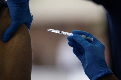 People receive COVID-19 booster vaccination in Michigan