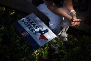 FILE PHOTO: Protesters take part in a march for voting rights