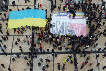 Anti-Putin protesters hold a rally in Kyiv