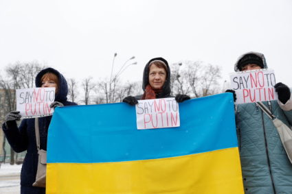 Anti-Putin protesters hold a rally in Kyiv