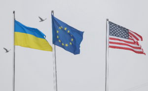 State flags of Ukraine, European Union and U.S. flutter in central Kyiv