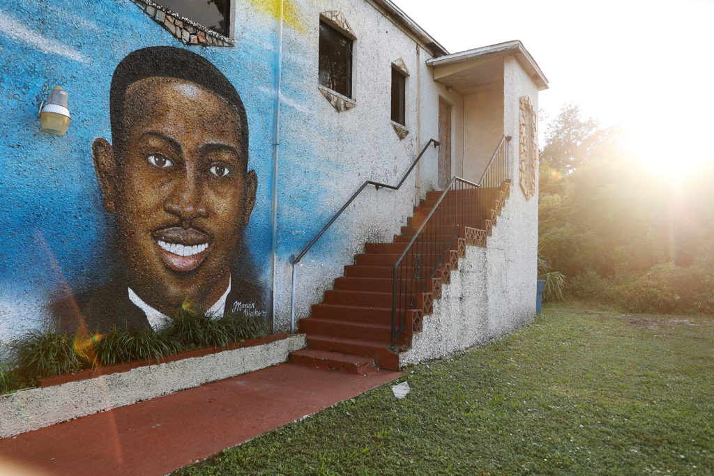 A mural of Ahmaud Arbery is painted on the side of The Brunswick African American Cultural Center in downtown Brunswick, G...