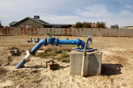 The only water pump that provides water to the community operates from an empty field in Teviston, California, U.S., October 20, 2021. Photo by Stephanie Keith/REUTERS