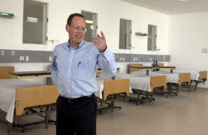 In this picture taken Jan. 10, 2012, Partners in Health's co-founder, Dr. Paul Farmer, gestures during the inauguration of national referral and teaching hospital in Mirebalais, 30 miles (48 kilometers) north of Port-au-Prince, Haiti. Photo by Dieu Nalio Chery/AP
