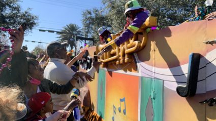 Krewe of Nefertiti parade through the streets of New Orleans.