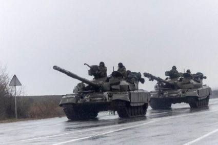 Ukrainian tanks move into the city, after Russian President Vladimir Putin authorized military operation in eastern Ukrain...