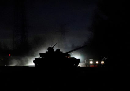 A tank drives along a street in Donetsk