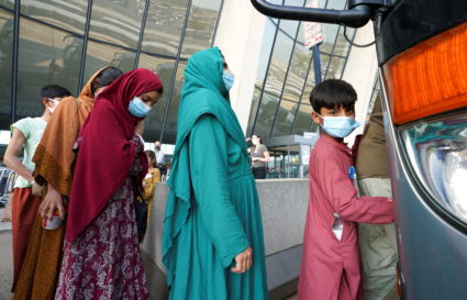 Afghan refugees arrive at Dulles Airport in Virginia