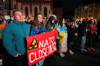Ukrainian President Volodymyr Zelenskiy appears on a screen at the famous city centre Roemerberg in Frankfurt