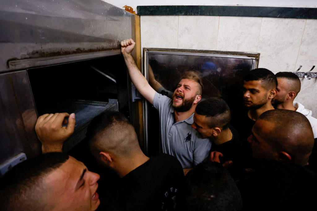 Relatives of Palestinian man react in Jenin in the Israeli- occupied West Bank